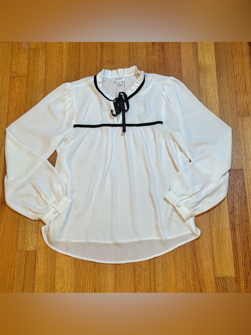 J.Crew White blouse featuring black contrast trim and a tie-neck detail.size XS